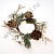 Венок с белыми ягодами и шишками 																										